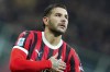 AC Milan's Theo Hernandez celebrates after scoring his side's second goal during the Serie A soccer match between AC Milan and Lecce at the San Siro stadium in Milan, Italy, Friday, Sept. 27, 2024. (Spada/LaPresse via AP)