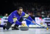 Alberta-Sluchinski skip Aaron Sluchinski delivers a rock while playing Team Canada during the Brier, in Regina, Thursday, March 7, 2024. THE CANADIAN PRESS/Darryl Dyck
