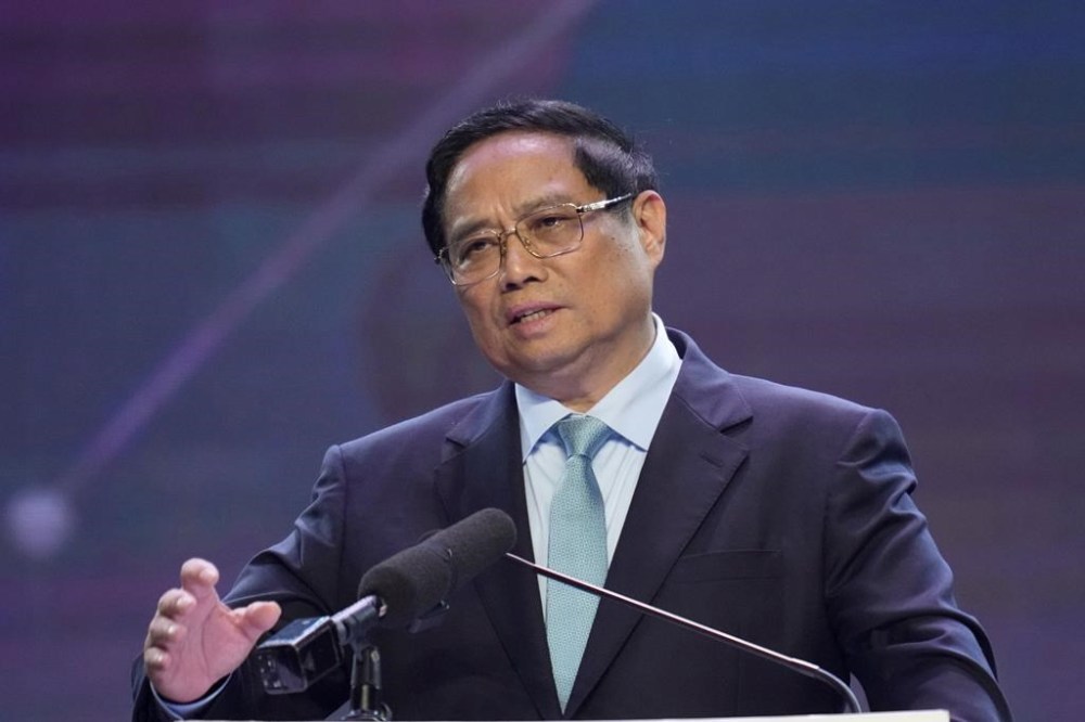 Vietnam's Prime Minister Pham Minh Chinh delivers a speech at the Association of Southeast Asian Nations (ASEAN) Business Investment Summit in Vientiane, Laos, Tuesday, Oct. 8, 2024. (AP Photo/Sakchai Lalit)