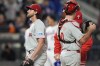Philadelphia Phillies pitcher Aaron Nola (27) leaves the game during the sixth inning of Game 3 of the National League baseball playoff series against the New York Mets, Tuesday, Oct. 8, 2024, in New York. (AP Photo/Frank Franklin II)