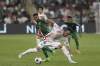 Japan's Koki Machida shoots the ball during the World Cup 2026 qualifier soccer match between Japan and Saudi Arabia at the King Abdullah Sports City, in Jeddah, Saudi Arabia, Thursday, Oct. 10, 2024. (AP Photo)