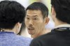 Son Woong-jung, center, father of English Premier League star Son Heung-min, waits for his book signing event in Seoul, South Korea, Wednesday, June 26, 2024. (Park Jin-hee/Newsis via AP)