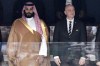 FILE - Saudi Arabia Crown Prince Mohammed bin Salman, left, and FIFA President Gianni Infantino, stand for the anthem prior to the match between Russia and Saudi Arabia which opened the 2018 soccer World Cup at the Luzhniki stadium in Moscow, Russia, on June 14, 2018. (Alexei Nikolsky, Sputnik, Kremlin Pool Photo via AP, File)