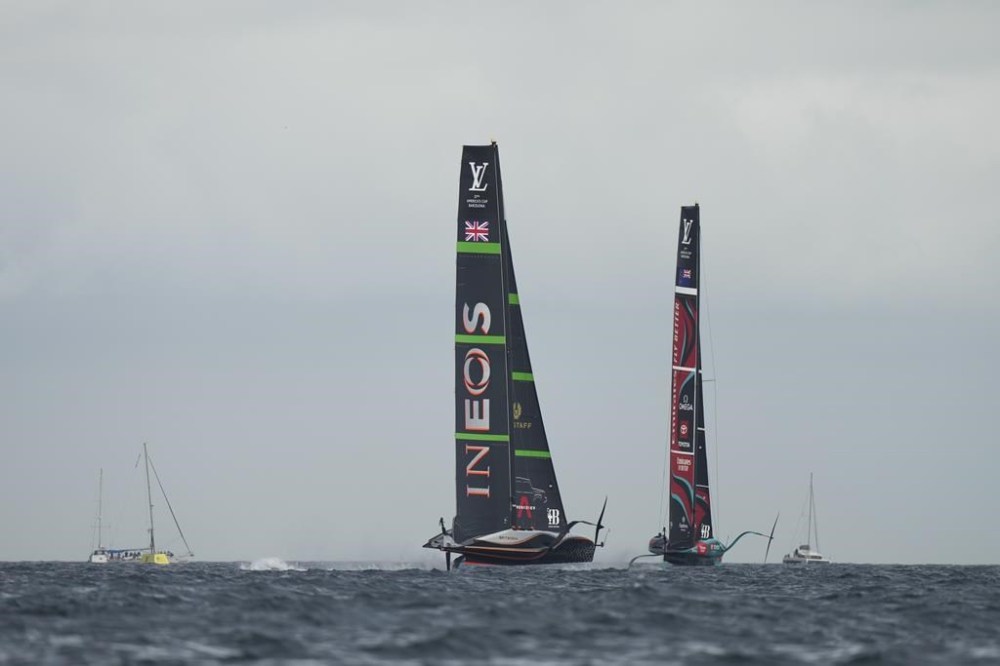 Ineos Britannia and Emirates Team New Zealand race during the Louis Vuitton 37th America's Cup race in Barcelona, Spain, Saturday, Oct. 12, 2024. (AP Photo/Bernat Armangue)