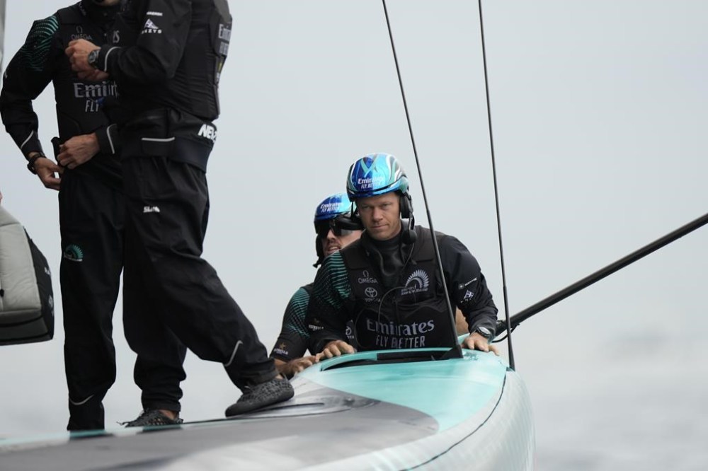 Emirates Team New Zealand crew prepares for the Louis Vuitton 37th America's Cup race in Barcelona, Spain, Saturday, Oct. 12, 2024. (AP Photo/Bernat Armangue)