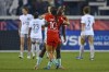 Kansas City Current forward Temwa Chawinga (6) is congratulated by teammate Lo'eau LaBonta (10) after defeating Bay FC in an NWSL soccer match against Bay FC at PayPal Park in San Jose, Calif., Saturday, Oct. 12, 2024. (Jose Carlos Fajardo/Bay Area News Group via AP)