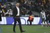 Australia's coach Tony Popovic gestures during the World Cup 2026 Group C qualifying soccer match between Australia and China at Adelaide Oval, Adelaide, Australia, Thursday Oct. 10, 2024. (AP Photo/James Elsby)