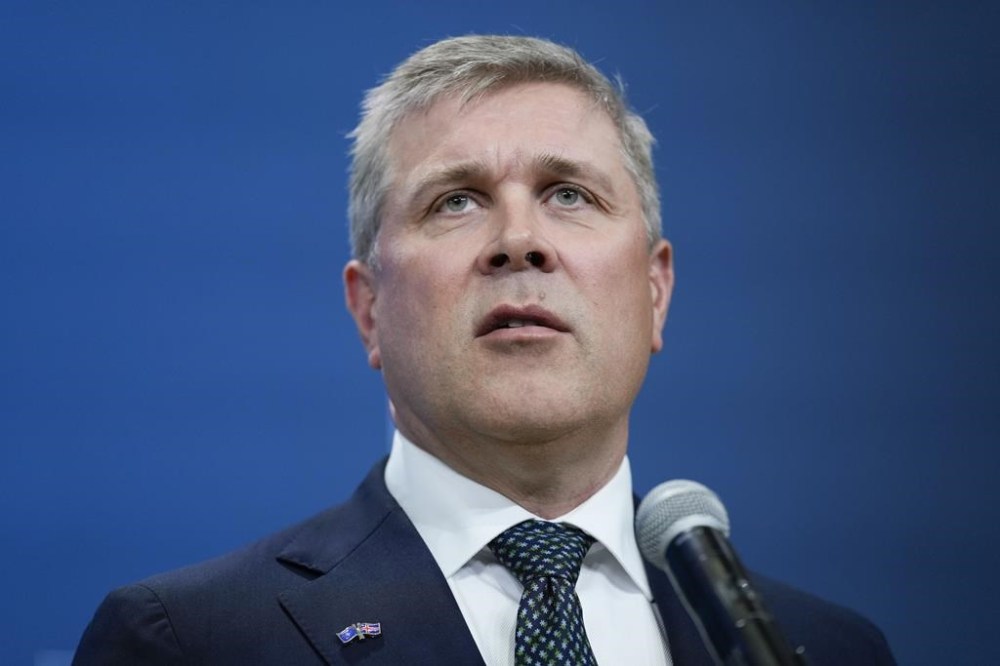 FILE - Iceland's Prime Minister Bjarni Benediktsson speaks to members of the media during his arrival at the NATO summit in Washington, Wednesday, July 10, 2024. (AP Photo/Matt Rourke, File)