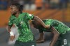 FILE - Nigeria's Ademola Lookman, left, celebrates with Nigeria's Victor Osimhen after scoring his sides first goal during the African Cup of Nations Round of 16 soccer match between Nigeria and Cameroon, at the Felix Houphouet Boigny stadium in Abidjan, Ivory Coast, Saturday, Jan. 27, 2024. (AP Photo/Sunday Alamba, File)
