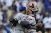 New York Mets pitcher Edwin Díaz, left, celebrates with catcher Francisco Alvarez after their win against the Los Angeles Dodgers in Game 2 of a baseball NL Championship Series, Monday, Oct. 14, 2024, in Los Angeles.(AP Photo/Gregory Bull)