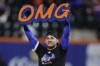 FILE - New York Mets second baseman Jose Iglesias celebrates on the field after the Mets beat the Philadelphia Phillies in Game 4 of the National League baseball playoff series, Oct. 9, 2024, in New York. (AP Photo/Adam Hunger, File)