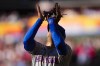 New York Mets second baseman Jose Iglesias catches a fly out by Philadelphia Phillies' Alec Bohm during the first inning of Game 1 of a baseball NL Division Series, Saturday, Oct. 5, 2024, in Philadelphia. (AP Photo/Matt Slocum)