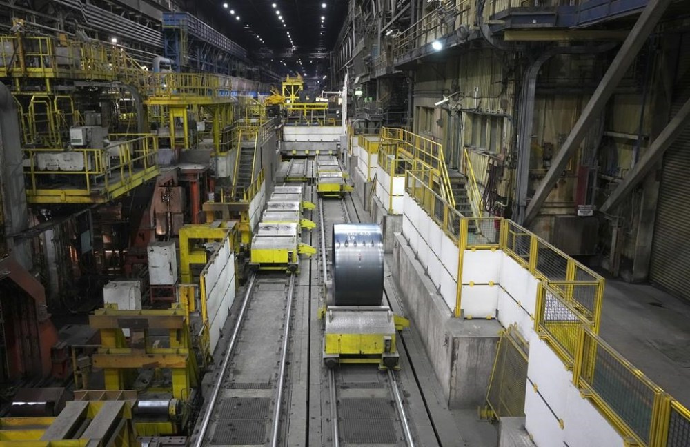 A view of the production line at ArcelorMittal Dofasco, a manufacturer of hot rolled steel coils, is shown in Hamilton on Thursday, Oct. 13, 2022. Statistics Canada says manufacturing sales in August fell to their lowest level since January 2022 as sales in the primary metal and petroleum and coal product subsectors fell.THE CANADIAN PRESS/Nathan Denette