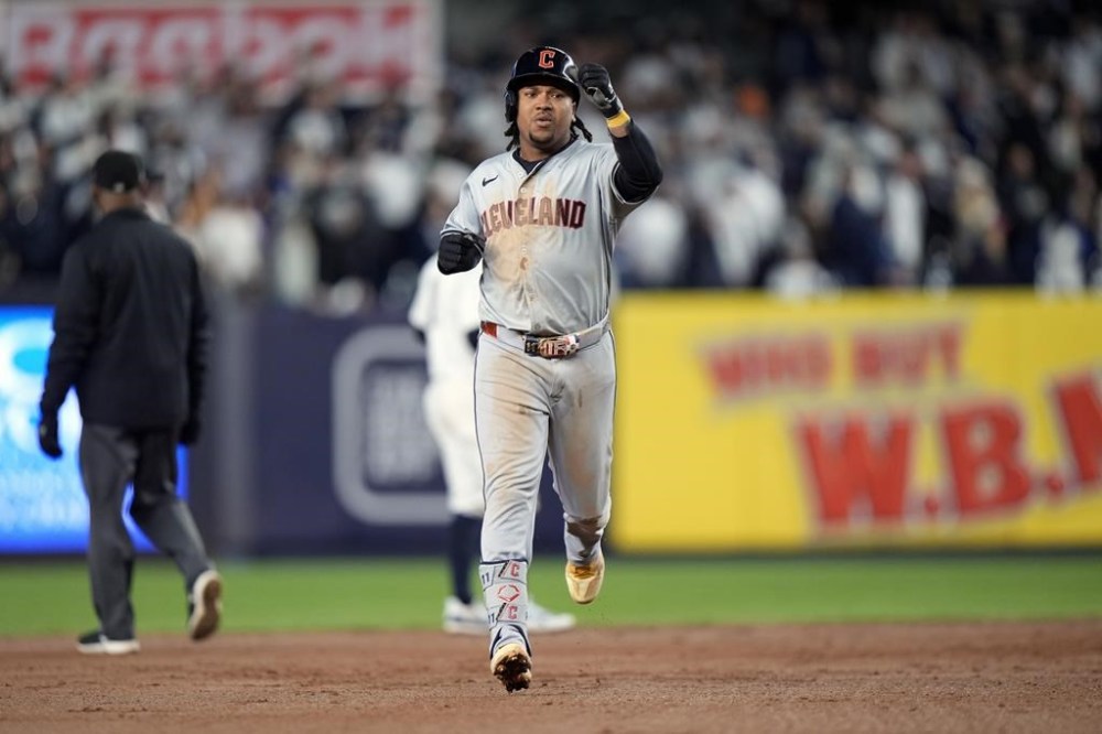 Cleveland Guardians' José Ramírez celebrates after hitting a home run against the New York Yankees during the ninth inning in Game 2 of the baseball AL Championship Series Tuesday, Oct. 15, 2024, in New York. (AP Photo/Frank Franklin II)