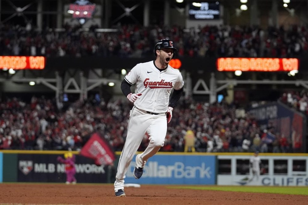 Cleveland Guardians' David Fry celebrates after hitting a game-winning two-run home run against the New York Yankees during the 10th inning in Game 3 of the baseball AL Championship Series Thursday, Oct. 17, 2024, in Cleveland. The Guardians won 7-5. (AP Photo/Jeff Roberson)