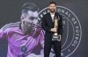Inter Miami forward Lionel Messi holds the MARCA America Award during a ceremony at Chase Stadium on Thursday, Oct. 17, 2024, in Fort Lauderdale, Fla. (Matias J. Ocner/Miami Herald via AP)