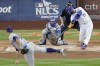 New York Mets' Pete Alonso hits a three-run home run against the Los Angeles Dodgers during the first inning in Game 5 of a baseball NL Championship Series, Friday, Oct. 18, 2024, in New York. (AP Photo/Adam Hunger)
