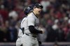 New York Yankees pitcher Tommy Kahnle celebrates after Game 4 of the baseball AL Championship Series against the Cleveland Guardians Friday, Oct. 18, 2024, in Cleveland. The Yankees won 8-6 to take a 3-1 lead in the best-of-seven series. (AP Photo/Godofredo A. Vásquez)