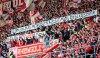 Mainz fans hold banners against former coach Jürgen Klopp on Saturday, Oct. 19, 2024 in Mainz, Germany. (Torsten Silz/dpa via AP)