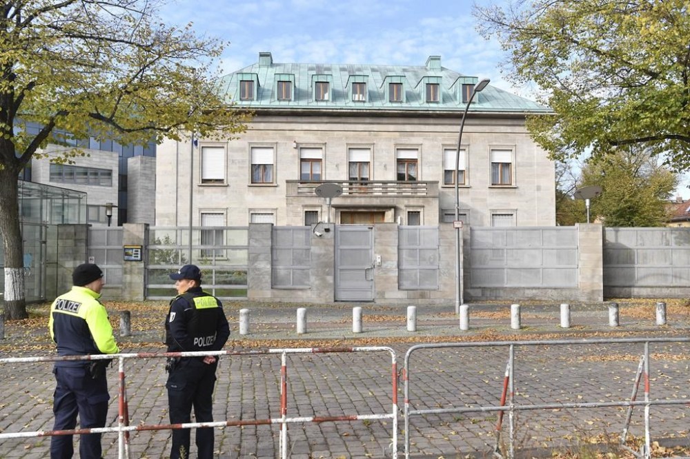 Police officers stand by the Israeli embassy in Berlin, Sunday, Oct. 20, 2024. (Paul Zinken/dpa via AP)