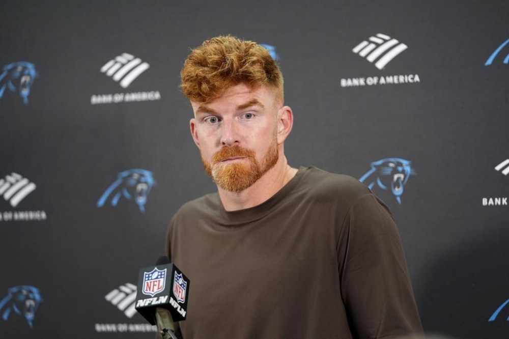 Carolina Panthers quarterback Andy Dalton speaks during a news conference after an NFL football game against the Washington Commanders, Sunday, Oct. 20, 2024, in Landover, Md. The Commanders 40-7. (AP Photo/Stephanie Scarbrough)