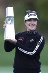 Hannah Green of Australia holds the winning trophy during the awards ceremony after winning the LPGA Ladies Championship golf tournament at the Seowon Valley Country Club in Paju, South Korea, Sunday, Oct. 20, 2024. (AP Photo/Lee Jin-man)