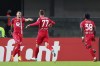 Monza's Dany Mota, left, celebrates scoring a goal with his teammates during the Serie A soccer match between Verona and Monza at the Marcantonio Bentegodi Stadium in Verona, Italy, Monday, Oct. 21, 2024. (Paola Garbuioi/LaPresse via AP)