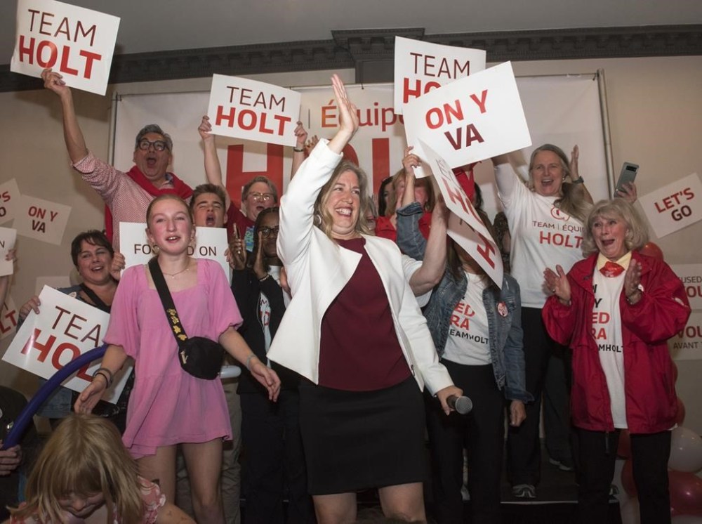 New Brunswick Liberal Leader and premier-elect Susan Holt waves to the crowd as she speaks to supporters in Fredericton, Monday, Oct. 21, 2024. New Brunswickers are waking up to a transformed political landscape, after the Liberal Party ended six years of Progressive Conservative rule in Monday's provincial election. THE CANADIAN PRESS/Stephen MacGillivray