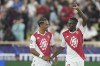 Monaco's Wilfried Singo, right, celebrates with his teammate after scoring the third goal during the Champions League opening phase soccer match between Monaco and Crvena Zvezda, Red Star Belgrade, at the Louis II stadium, in Monaco, Tuesday, Oct. 22, 2024. (AP Photo/Laurent Cipriani)