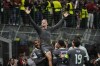 AC Milan's Francesco Camarda celebrates after scoring a goal that was later disallowed, during the Champions League opening phase soccer match between AC Milan and Club Brugge at the San Siro stadium in Milan, Italy, Tuesday, Oct. 22, 2024. (AP Photo/Antonio Calanni)