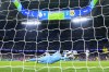 Real Madrid's goalkeeper Thibaut Courtois blocks a shoot during the Champions League opening phase soccer match between Real Madrid and Borussia Dortmund at the Santiago Bernabeu stadium in Madrid, Tuesday, Oct. 22, 2024. (AP Photo/Manu Fernandez)