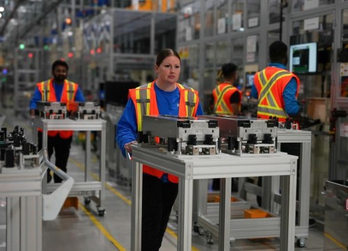 A NextStar Energy employee moves completed battery modules at their plant in Windsor, Ont., in an undated handout photo. THE CANADIAN PRESS/HO-NextStar, *MANDATORY CREDIT*
