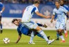 CF Montreal midfielder Caden Clark (left) is challenged by Atlanta United defender Stian Gregersen (5) during first half MLS playoff soccer action in Montreal, Tuesday, October 22, 2024. THE CANADIAN PRESS/Christinne Muschi