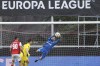Glimt's goalkeeper Nikita Haikin makes a save during the Europa League soccer match between SC Braga and Bodo Glimt at the Municipal stadium in Braga, Portugal, Wednesday, Oct. 23, 2024. (AP Photo/Luis Vieira)