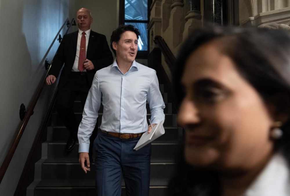 Prime Minister Justin Trudeau makes his way to caucus on Parliament Hill in Ottawa, Wednesday, Oct. 23, 2024. THE CANADIAN PRESS/Adrian Wyld