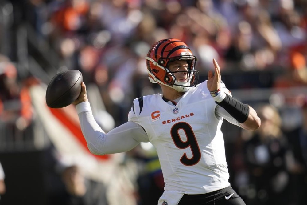 Cincinnati Bengals quarterback Joe Burrow (9) drops back to pass in the second half of an NFL football game against the Cleveland Browns, Sunday, Oct. 20, 2024, in Cleveland. (AP Photo/Sue Ogrocki)