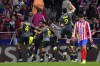 Lille's Jonathan David celebrates with teammates after scoring his sides third goal during the Champions League opening phase soccer match between Atletico Madrid and Lille at the Metropolitano stadium in Madrid, Spain, Wednesday, Oct. 23, 2024. (AP Photo/Manu Fernandez)