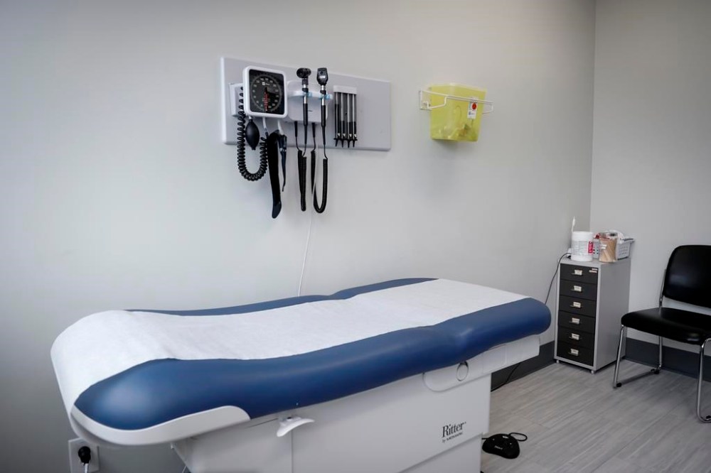An exam room is seen at a health clinic in Calgary, July 14, 2023. A new report by the Canadian Institute for Health Information says 83 per cent of adults in this country have a regular primary-care provider but that still leaves 5.4 million adults without one. THE CANADIAN PRESS/Jeff McIntosh