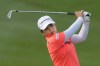 Mao Saigo of Japan watches her shot on the 3th fairway during the first round of Maybank LPGA Championship golf tournament at Kuala Lumpur Golf and Country club in Kuala Lumpur, Thursday, Oct. 24, 2024. (AP Photo/Vincent Thian)