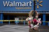 A Walmart remains closed as a vigil grows outside the taped-off area in Halifax on Wednesday, October 23, 2024 following the death of a 19-year-old employee last weekend. The Maritime Sikh Society has named a 19-year-old woman who died in a Walmart bakery's walk-in oven and says the mother — a co-worker at the store — was the one who led a search for her and discovered her body. THE CANADIAN PRESS/Darren Calabrese