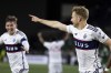 Vancouver Whitecaps midfielder Stuart Armstrong, right, celebrates the goal against the Portland Timbers during the second half of an MLS soccer match Wednesday, Oct. 23, 2024, in Portland, Ore. THE CANADIAN PRESS/AP-Howard Lao