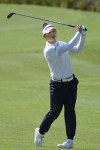 Amy Yang of South Korea's watches her fairway shot on the third hole during the second round of Maybank LPGA Championship golf tournament at Kuala Lumpur Golf and Country club in Kuala Lumpur, Thursday, Oct. 24, 2024. (AP Photo/Vincent Thian)