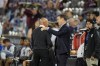 Colorado Rapids head coach Chris Armas confers with Los Angeles Galaxy head coach Greg Vanney in the first half of an MLS soccer match Wednesday, Oct. 2, 2024, in Commerce City, Colo. THE CANADIAN PRESSAP, David Zalubowski