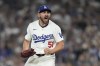 Los Angeles Dodgers relief pitcher Alex Vesia celebrates after striking out San Diego Padres' Jackson Merrill during the seventh inning in Game 5 of a baseball NL Division Series Friday, Oct. 11, 2024, in Los Angeles. (AP Photo/Ashley Landis)