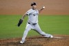 Los Angeles Dodgers pitcher Nestor Cortes throws against the Los Angeles Dodgers during the 10th inning in Game 1 of the baseball World Series, Friday, Oct. 25, 2024, in Los Angeles. (AP Photo/Julio Cortez)