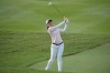 Jeeno Thitikul of Thailand hits from a fairway at the 2nd fairway during the first round of Maybank LPGA Championship golf tournament at Kuala Lumpur Golf and Country club in Kuala Lumpur, Thursday, Oct. 24, 2024. (AP Photo/Vincent Thian)