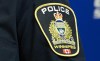 A Winnipeg Police Service shoulder patch is shown in Winnipeg, Sept. 2, 2021. A suspect has been arrested in Winnipeg in an assault that police say happened when a man broke into a secure area of a University of Manitoba residence and entered a woman's room. THE CANADIAN PRESS/David Lipnowski