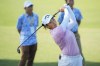 Ruoning Yin of China's watches her fairway shot on the third hole during the second round of Maybank LPGA Championship golf tournament at Kuala Lumpur Golf and Country club in Kuala Lumpur, Thursday, Oct. 24, 2024. (AP Photo/Vincent Thian)