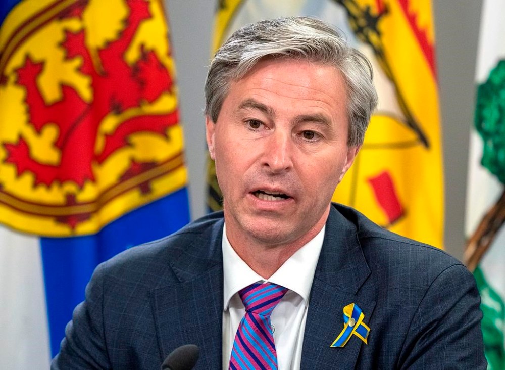 Nova Scotia Premier Tim Houston fields a question at a meeting of the Council of Atlantic Premiers in Halifax on Monday, March 21, 2022. THE CANADIAN PRESS/Andrew Vaughan
