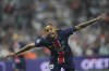 PSG's Bradley Barcola celebrates after scoring his side third goal during the League One soccer match between Marseille and Paris Saint-Germain, Sunday, Oct. 27, 2024 at the Velodrome stadium in Marseille, southern France. (AP Photo/Laurent Cipriani)